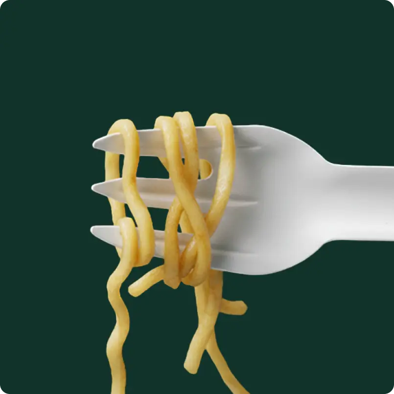 Paper fork holding noodles